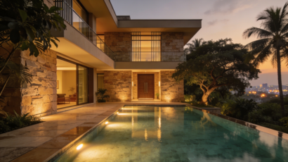Luxury villa exterior in Bangalore showcasing premium architecture, glass facades, and tropical landscaping at golden hour