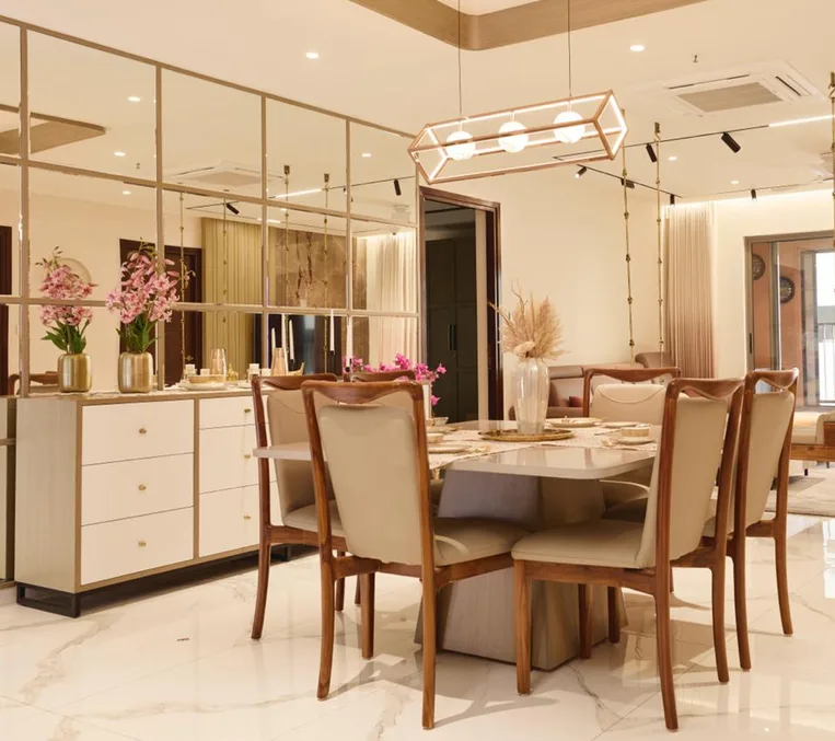 A dining space featuring table, and cabinet, showcasing a warm and inviting atmosphere.