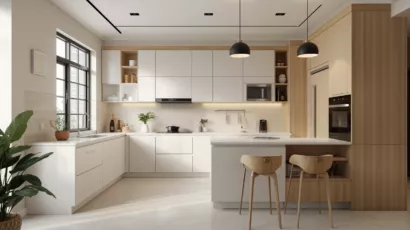 A modern kitchen featuring white cabinets and warm wooden floors, showcasing a clean and contemporary design.